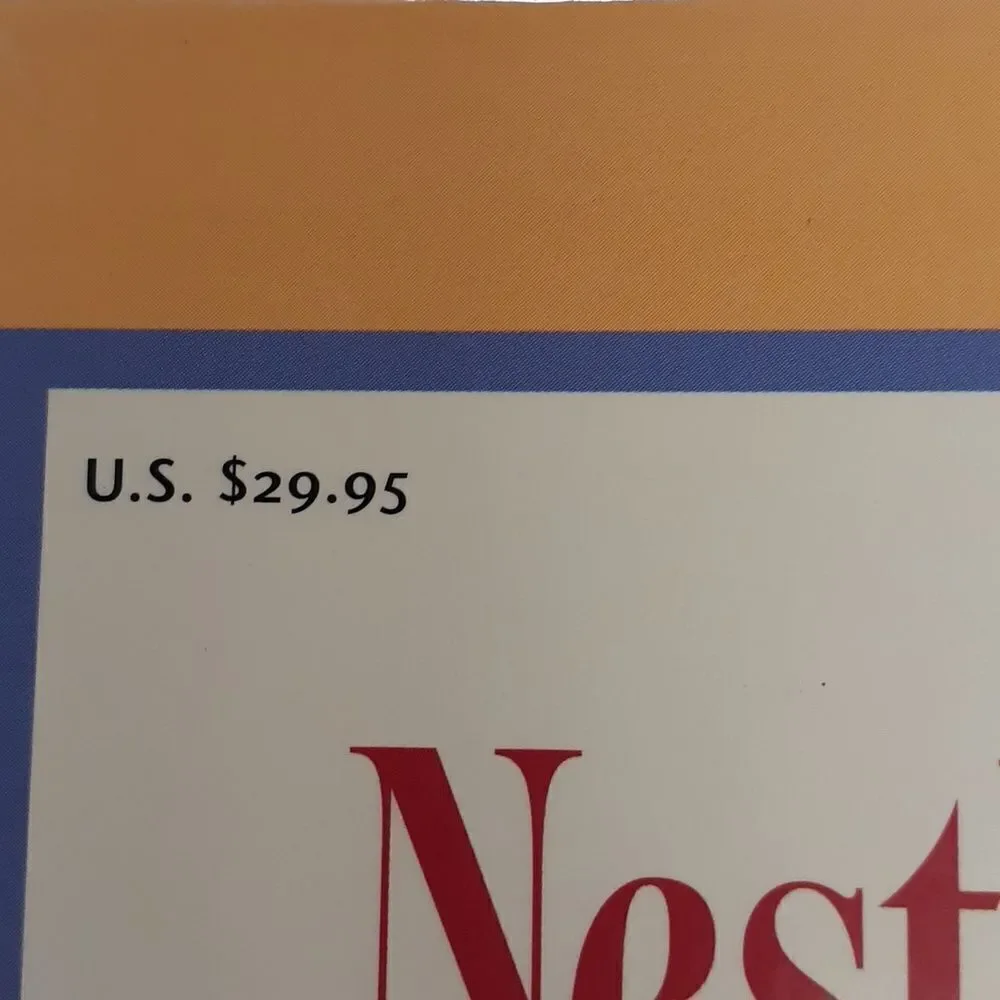 3-pc. Nestle's chocolate bundle: 2‎ vintage tins and a hardcover cookbook